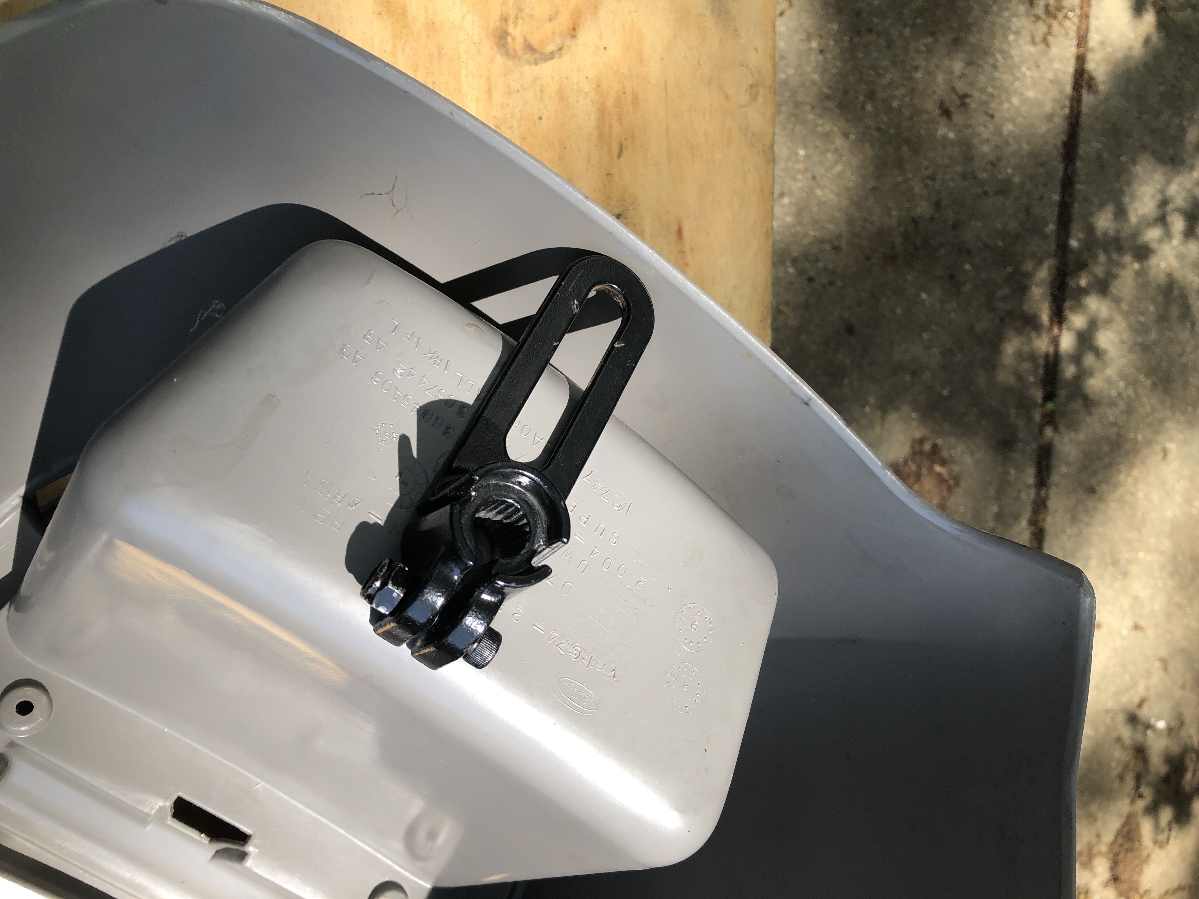 Mount foot upside down on underside of console