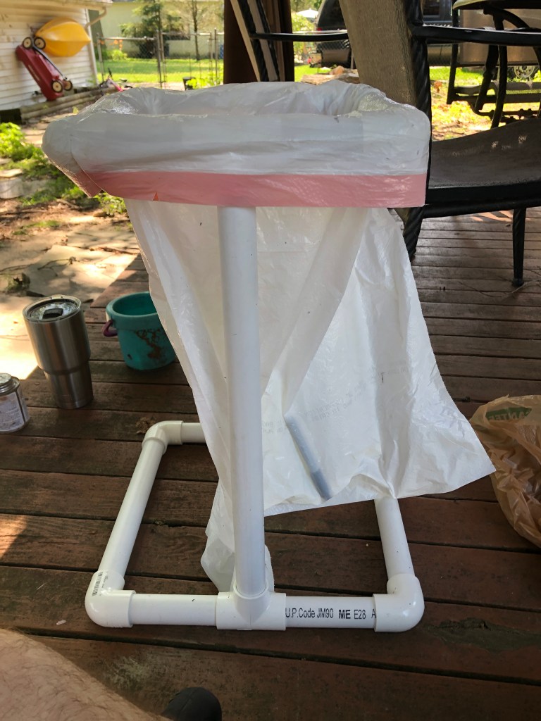 assembled trash bag holder with bag installed for test fitting.