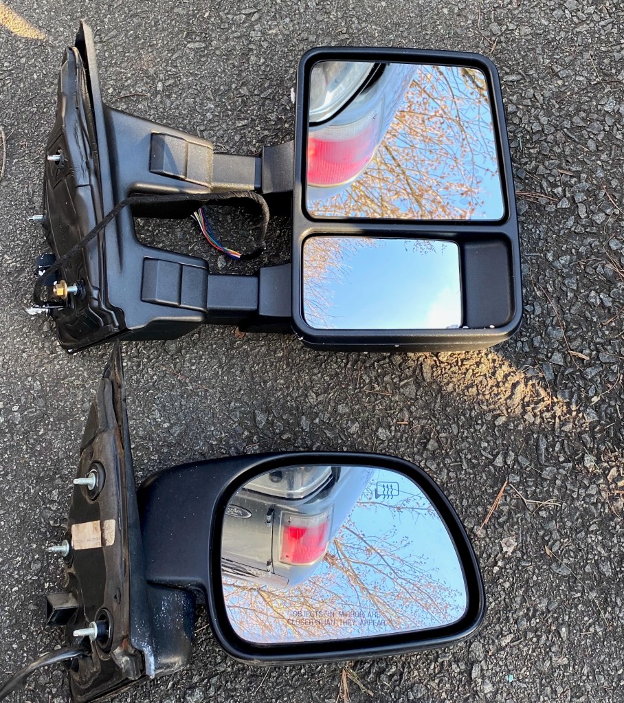 New mirror above with built in blind-spot mirror and marker light & turn signals.
Old mirror below